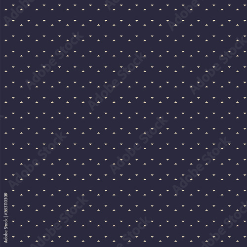 Seamless pattern of small triangles floating on a dark blue background