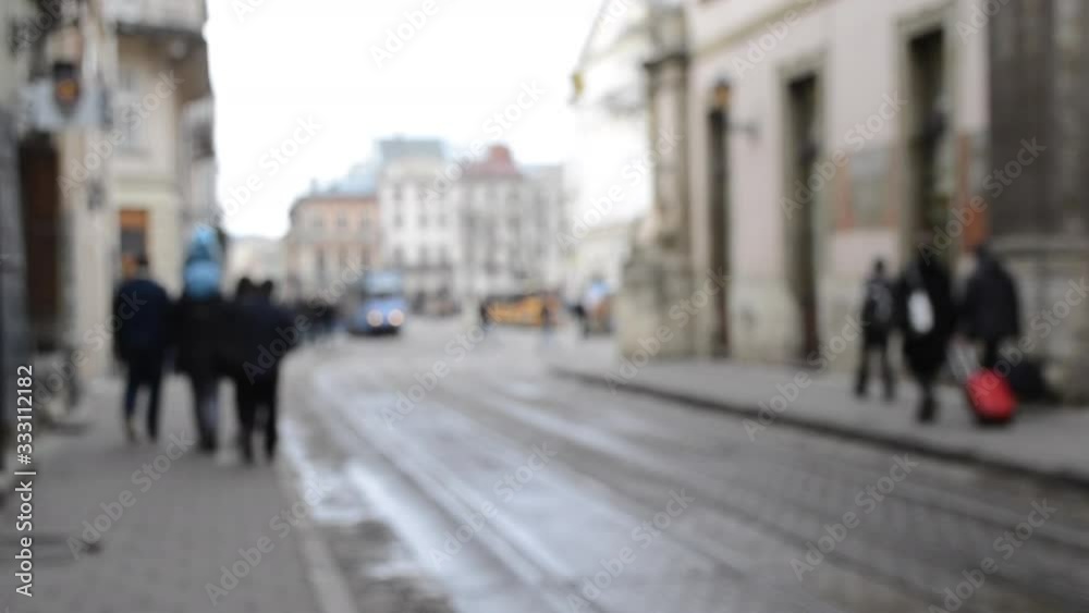 Blurred Background of many people on street square old ancient city Blurred Background of many people on street square old ancient city