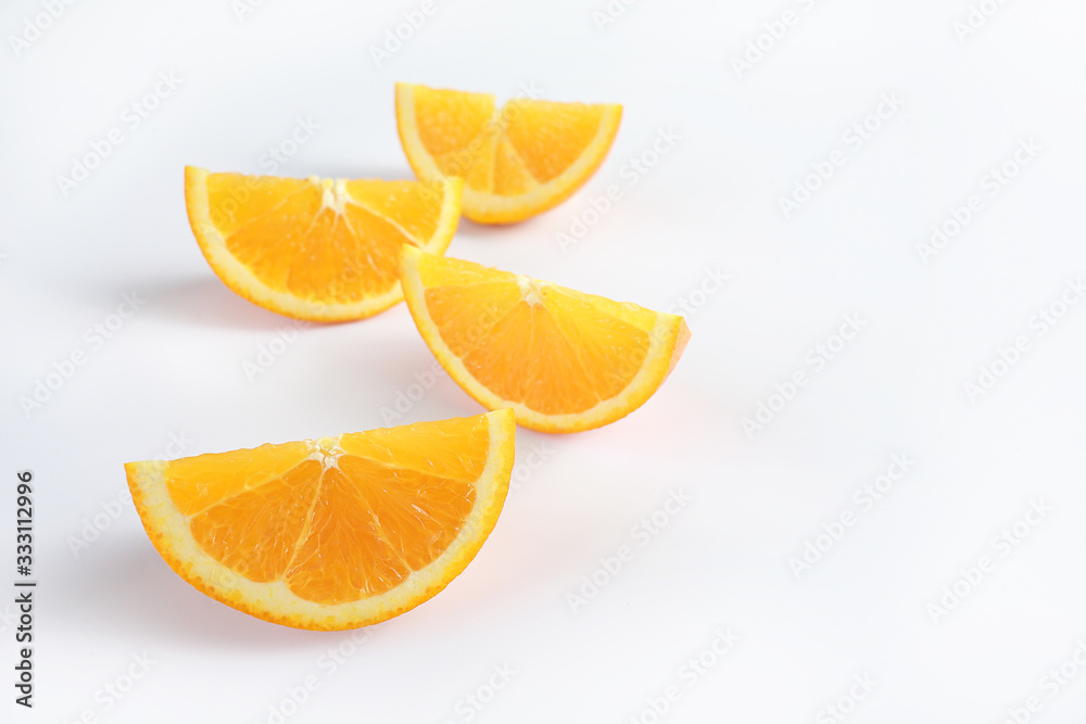 Fototapeta premium Cut fresh juicy orange isolated on white