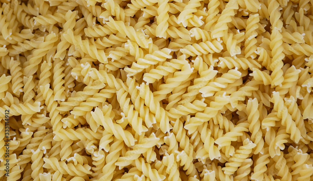 uncooked pasta background, healthy food closeup uncooked pasta background, healthy food closeup