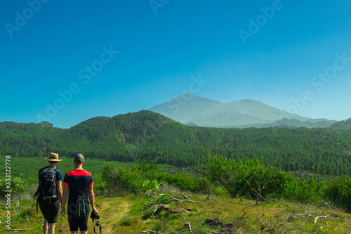 Photographers practicing hiking in the municipality of Santiago del Teide, Tenerife.