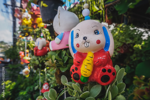 Children's toys on tropical plants photo