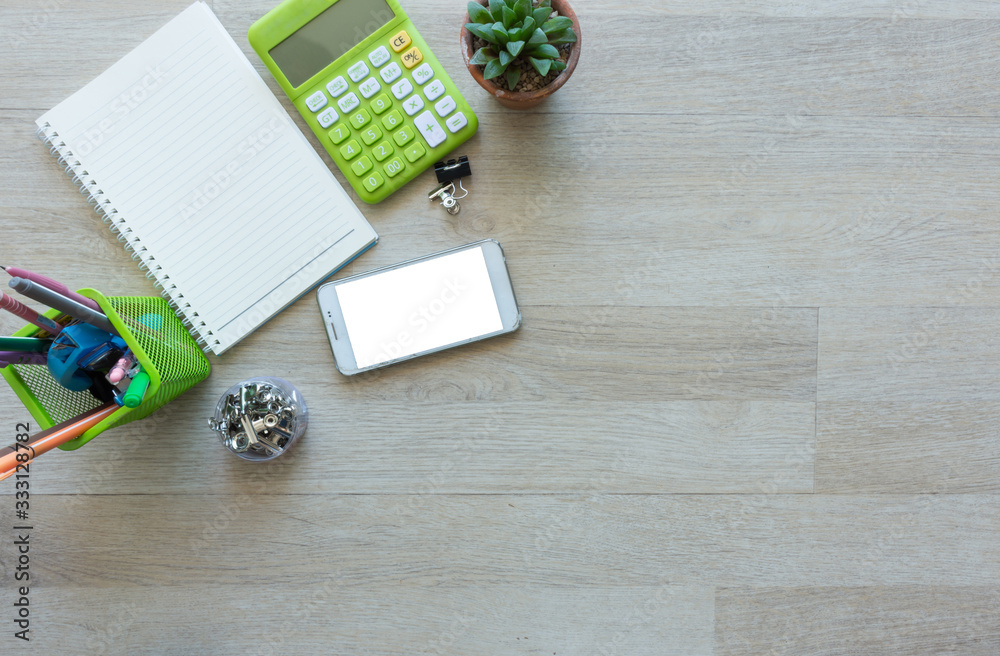 Flat lay of notebook with other on work desk.