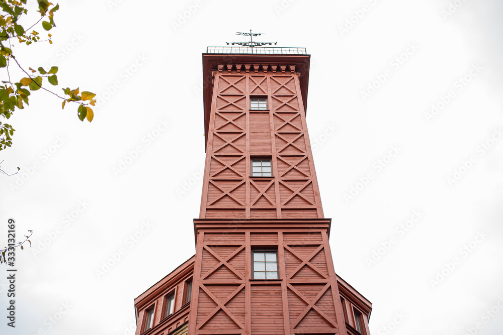 old wooden building. tall tower.