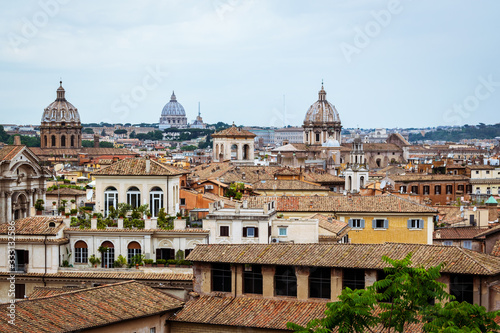View of Rome, Italy, showing old building, rooftops and church domes