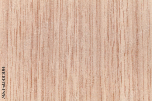 Texture of beige wooden background with striped pattern, closeup. Decorative brown wallpaper with wood effect.