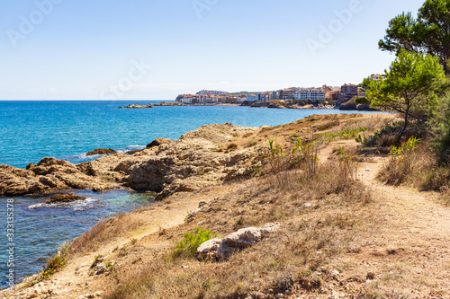 View from the coastal path the population of La Escala in the background  Catalonia  Spain