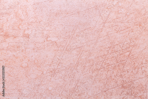 Texture of light pink old marble material with cracked pattern, macro background. Structure of rose stone, backdrop