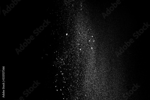Gorgeous white powder pattern isolated on black background