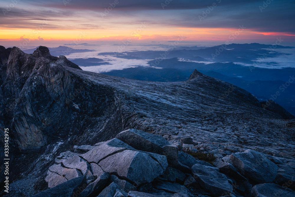 Fototapeta premium Kinabalu mountain view from top of Low's peak, highest peak in Kinabalu massif in Borneo island, Sabah state in Malaysia