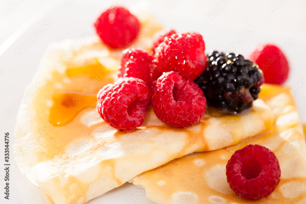pancakes with raspberries, blackberries and honey pancakes with raspberries, blackberries and honey