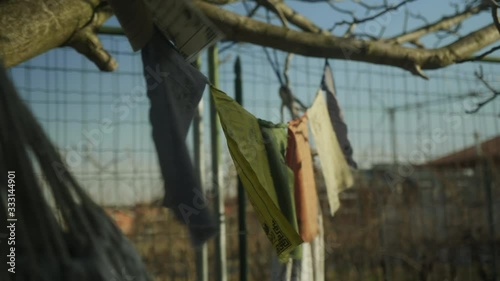 Close-up Tibetan flags moved by the wind  in a country house