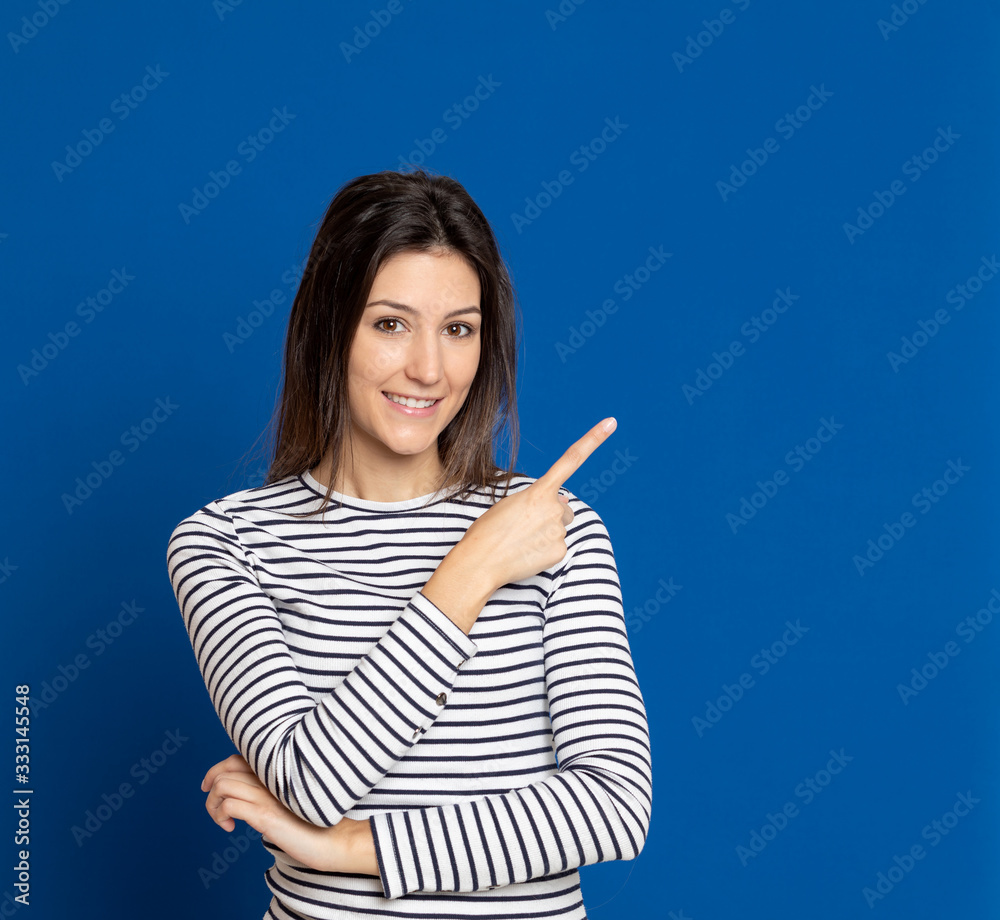 Brunette young woman wearing a striped T-shirt