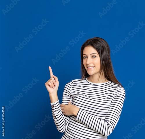 Brunette young woman wearing a striped T-shirt