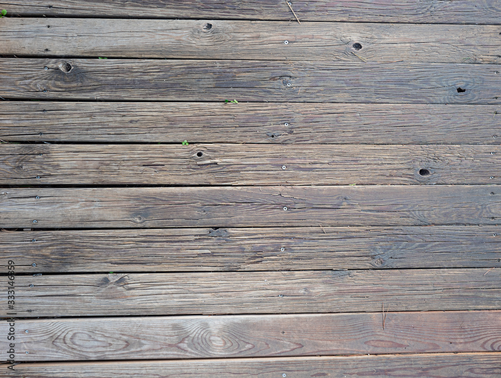 Strips of painted wooden planks floor in need Strips of painted wooden planks floor in need