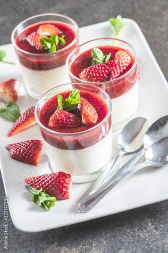 Italian dessert panna cotta with strawberries