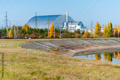 Fényképezés Scenic view of Chernobyl nuclear power plant block 3 and 4 with new protective s