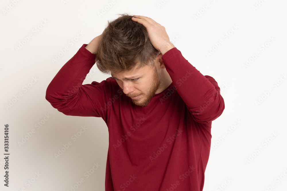 Attractive young guy with a red T-shirt Attractive young guy with a red T-shirt