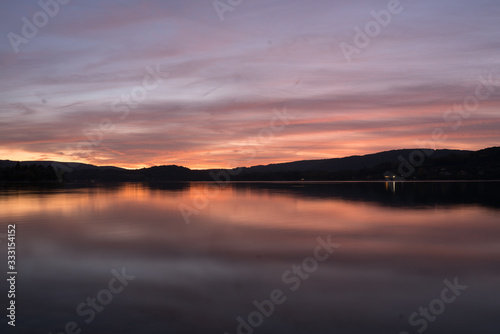 sunset on coast of lake © skazar