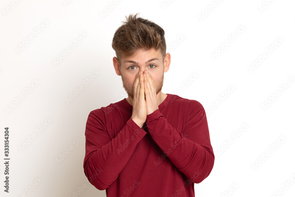Attractive young guy with a red T-shirt Attractive young guy with a red T-shirt