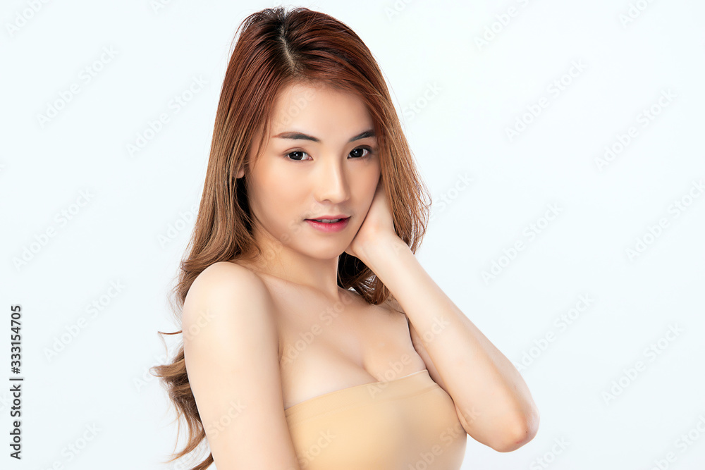 Beautiful Young Asian Woman with Clean Fresh Skin. Face care, Facial treatment, Cosmetology, beauty and healthy skin and cosmetic concept, woman beauty skin isolated on white background Beautiful Young Asian Woman with Clean Fresh Skin. Face care, Facial treatment, Cosmetology, beauty and healthy skin and cosmetic concept, woman beauty skin isolated on white background