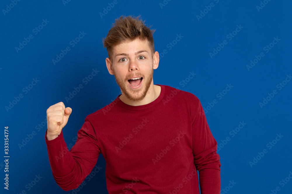 Attractive young guy with a red T-shirt Attractive young guy with a red T-shirt