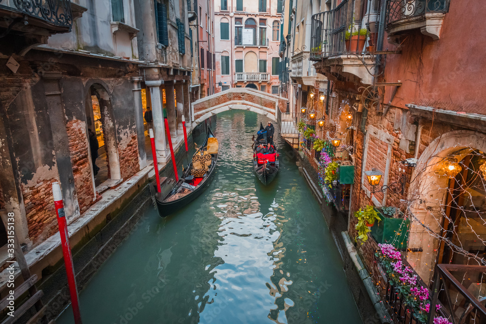 VENICE, VENETO / ITALY - DECEMBER 26 2019: Venice view VENICE, VENETO / ITALY - DECEMBER 26 2019: Venice view