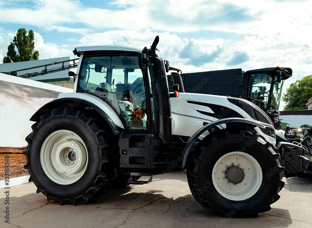 tractor with big wheels, machine for agricultural work and transportation of goods tractor with big wheels, machine for agricultural work and transportation of goods