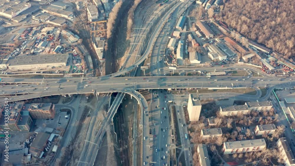 Aerial view of road junction in Moscow from above, automobile traffic and jam of many cars, road junction on the Zvenigorodskoe highway and the Third Ring Road. Aerial view of road junction in Moscow from above, automobile traffic and jam of many cars, road junction on the Zvenigorodskoe highway and the Third Ring Road.