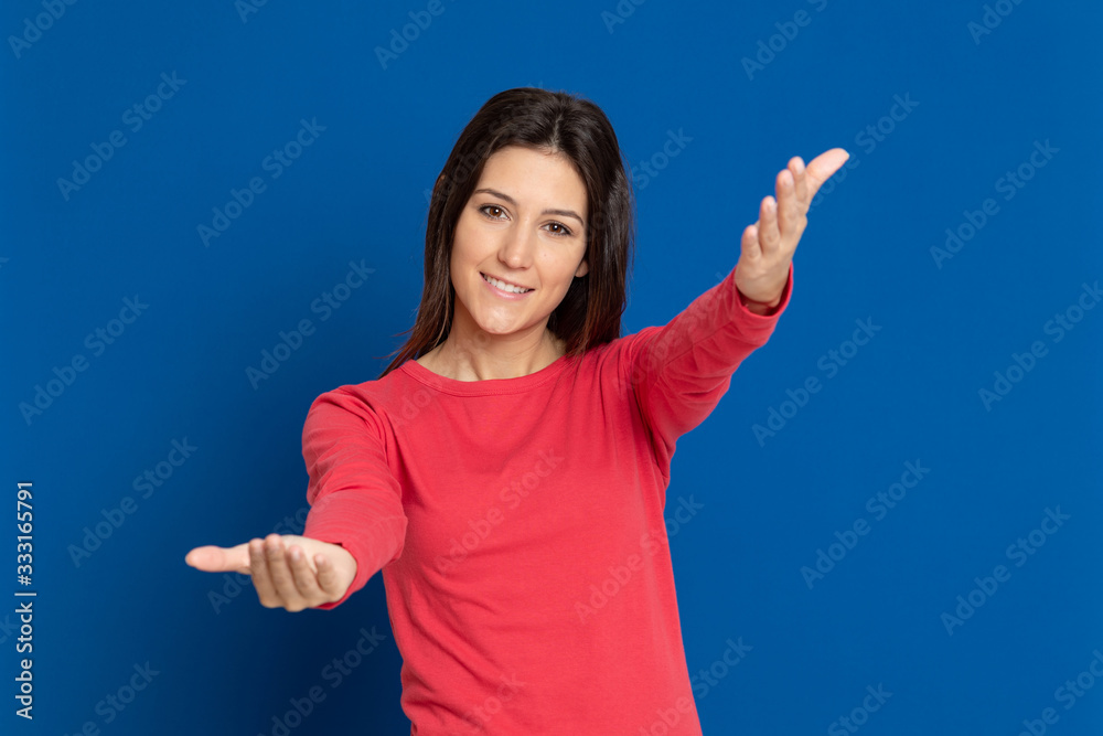Attractive brunette girl wearing a red T-shirt Attractive brunette girl wearing a red T-shirt