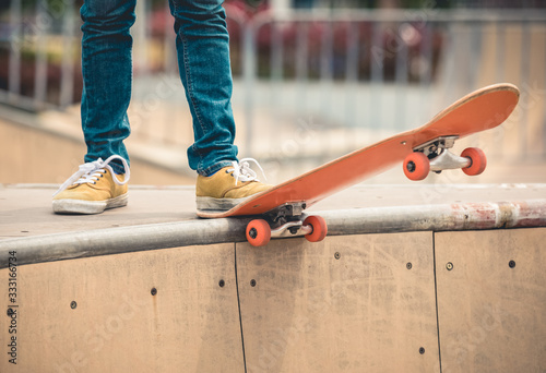 Canvas Print Skateboarder skateboarding at skatepark ramp