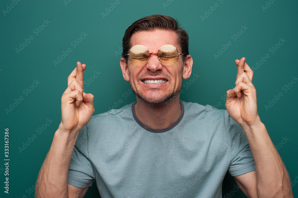 Portrait of a tense young man with glasses Portrait of a tense young man with glasses