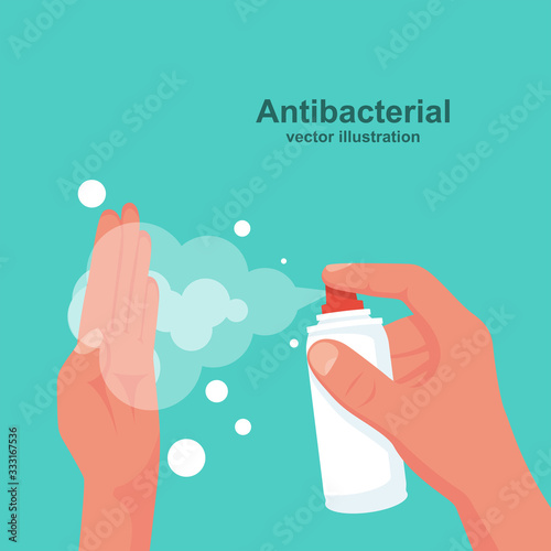 Human uses antibacterial spray. Personal hygiene concept.