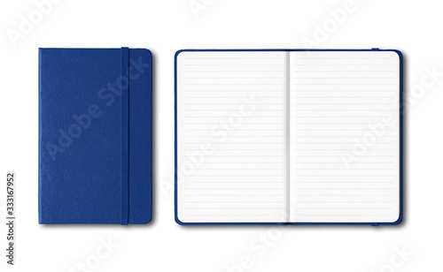 Marine blue closed and open lined notebooks isolated on white
