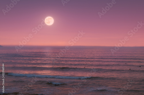 seascape with full moon on the sea at twilight