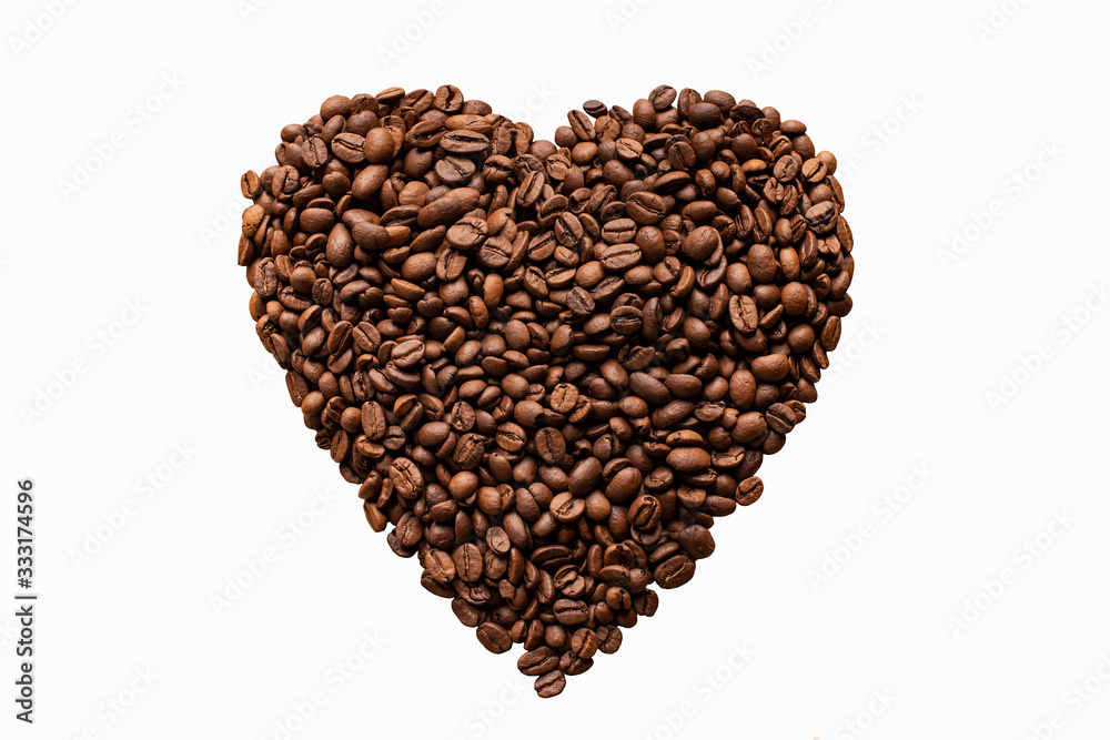 coffee beans laid in the shape of a heart isolated on a white background coffee beans laid in the shape of a heart isolated on a white background