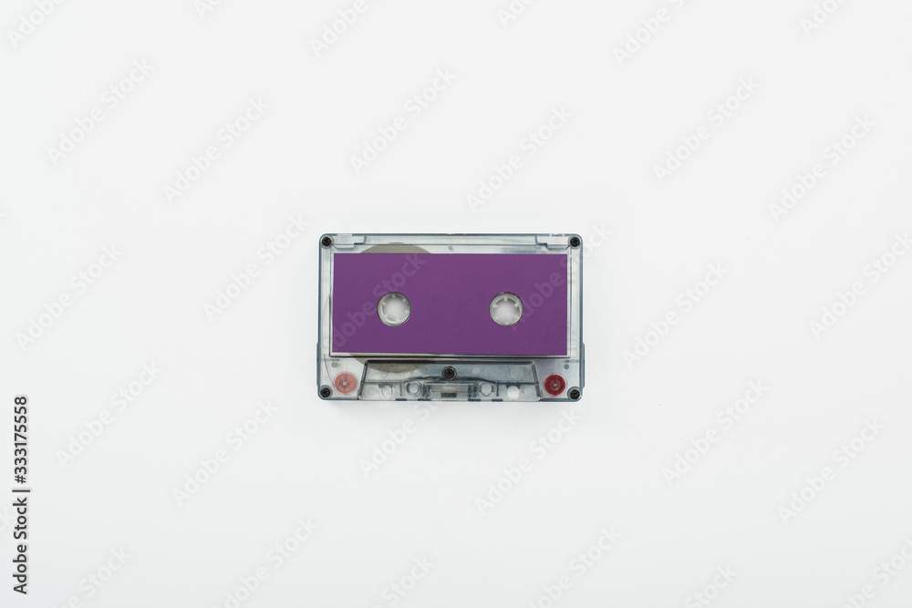 Obraz premium top view of purple cassette isolated on white