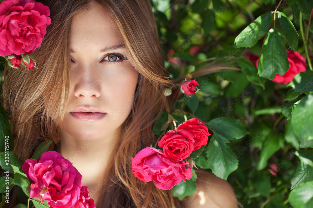 Beautiful woman portrait with roses. A young and attractive girl. Beautiful woman portrait with roses. A young and attractive girl.