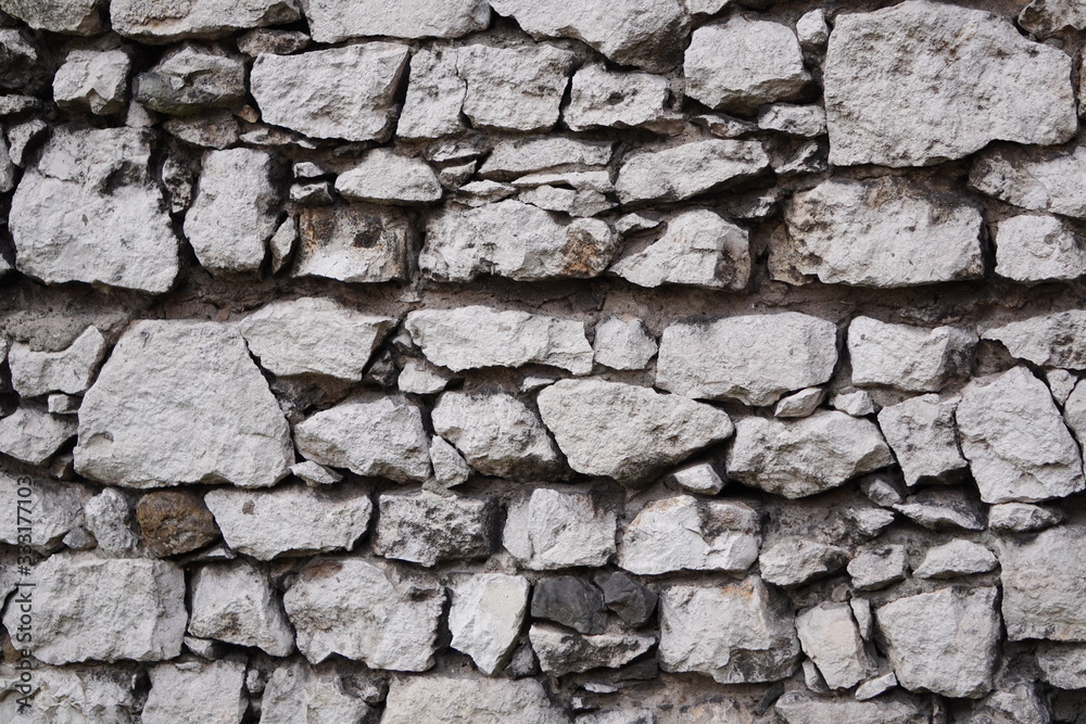 Stone wall, large gray stones, civil and industrial construction. Stone wall, large gray stones, civil and industrial construction.