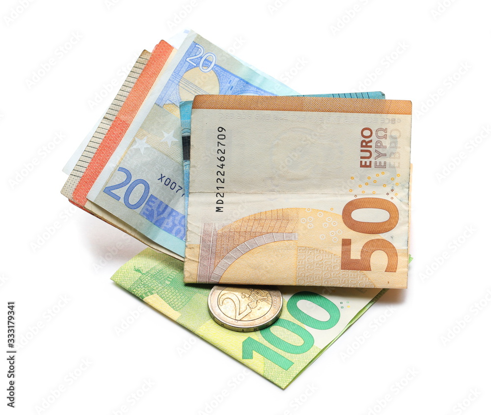 Euro banknotes with change, cash money and coins isolated on white background Euro banknotes with change, cash money and coins isolated on white background