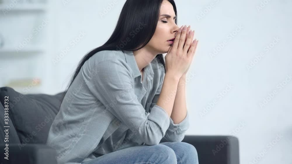 upset woman holding folder at home upset woman holding folder at home