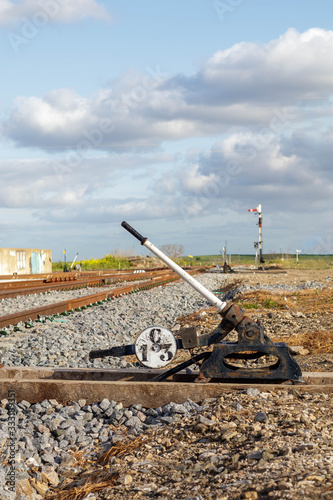 Manual points at the side of a railway track in Llenera Spain photo