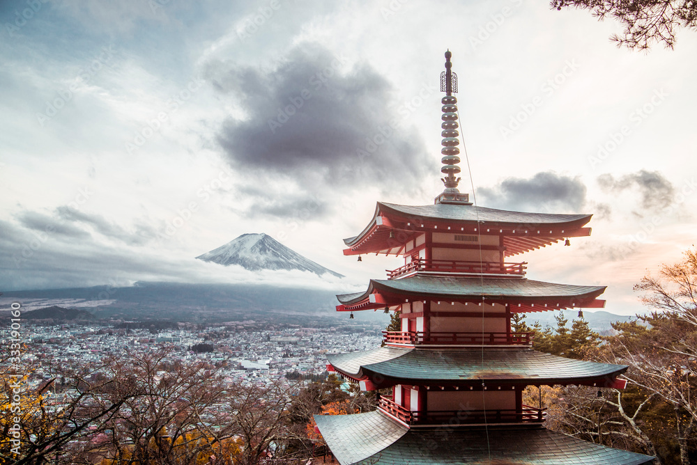 Pagoda Temple with sunset over Mount Fuji