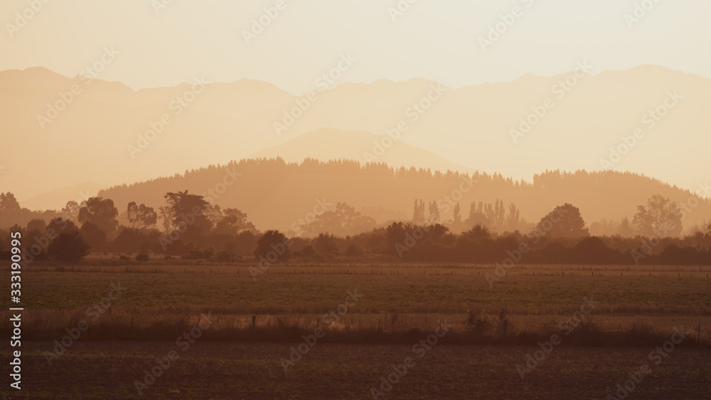 Fototapeta premium orange dawn in kaikoura new zealand