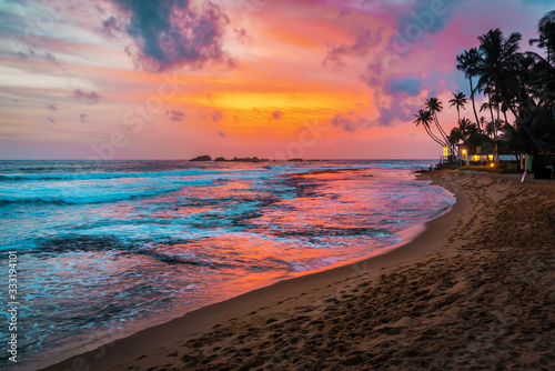 beautiful tropical sunset and beach © Volodymyr Shevchuk