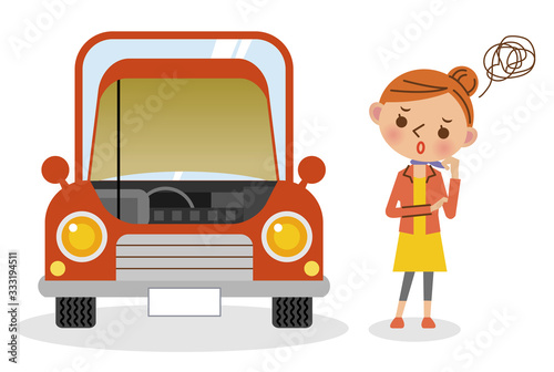 故障した車と困っている女性ドライバー