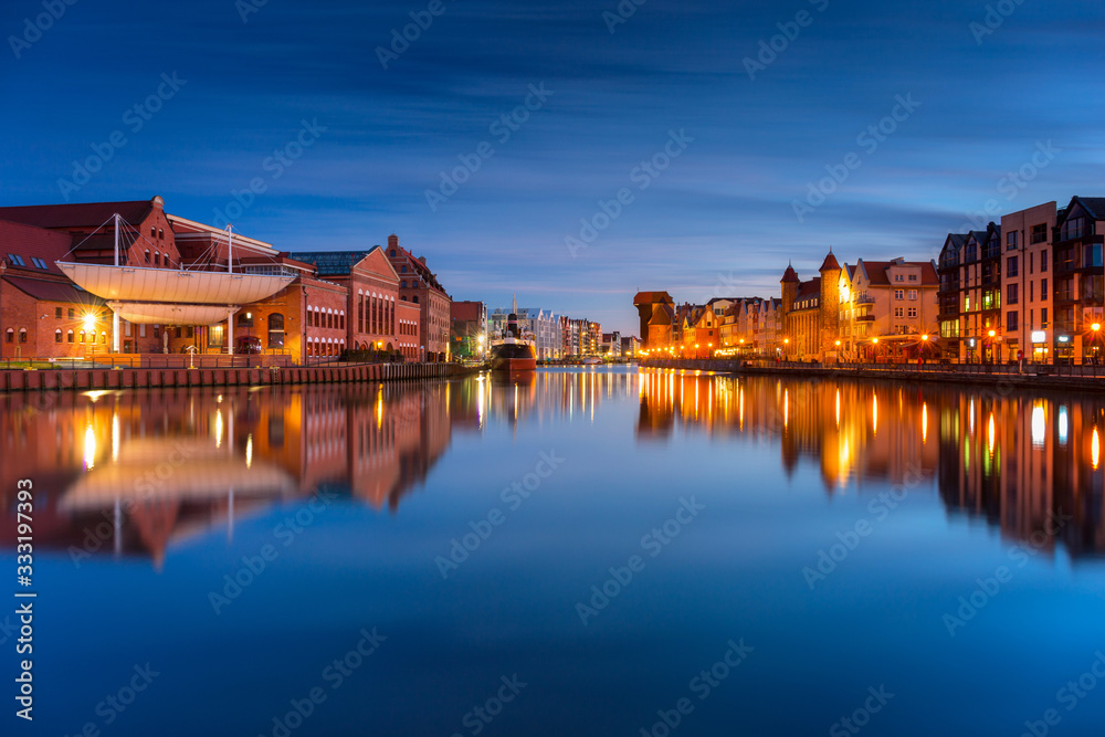 Gdansk with beautiful old town over Motlawa river at dusk, Poland.