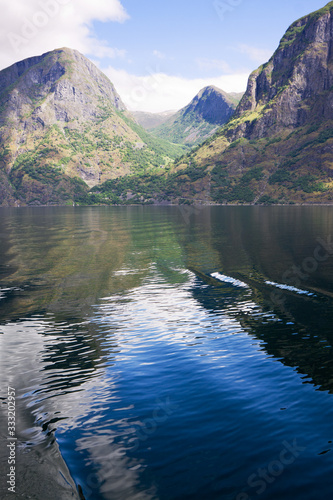 The roll-call of sky and water in the Aurlandsfjord in Norway. The Aurlandsfjord is a branch of the large Sognefjord