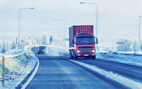 Truck on Snow Road in winter Lapland at Finland reflex