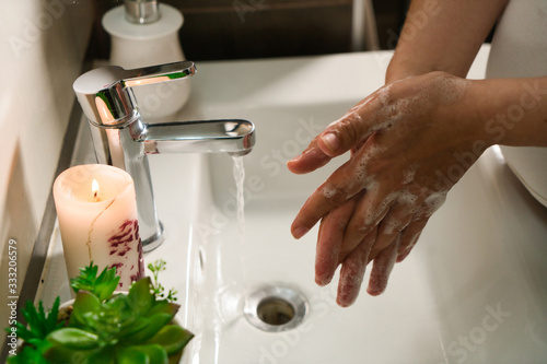 Corona Virus pandemic protection by washing hands frequently.